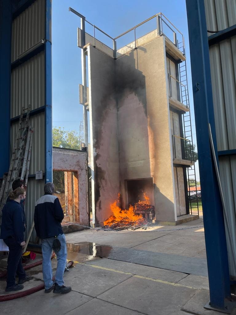 Ignition. The crib alight at the opening, and the fire beginning to climb the face.