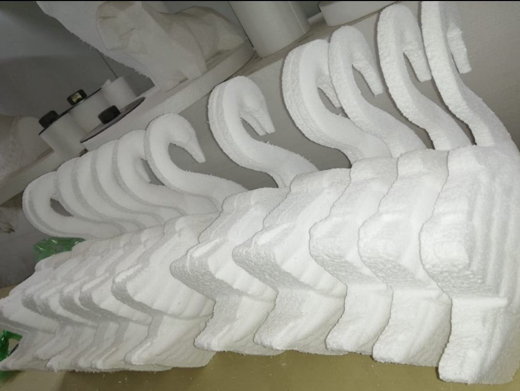 Batch of swan-shaped corbel brackets, CNC-milled and stacked together