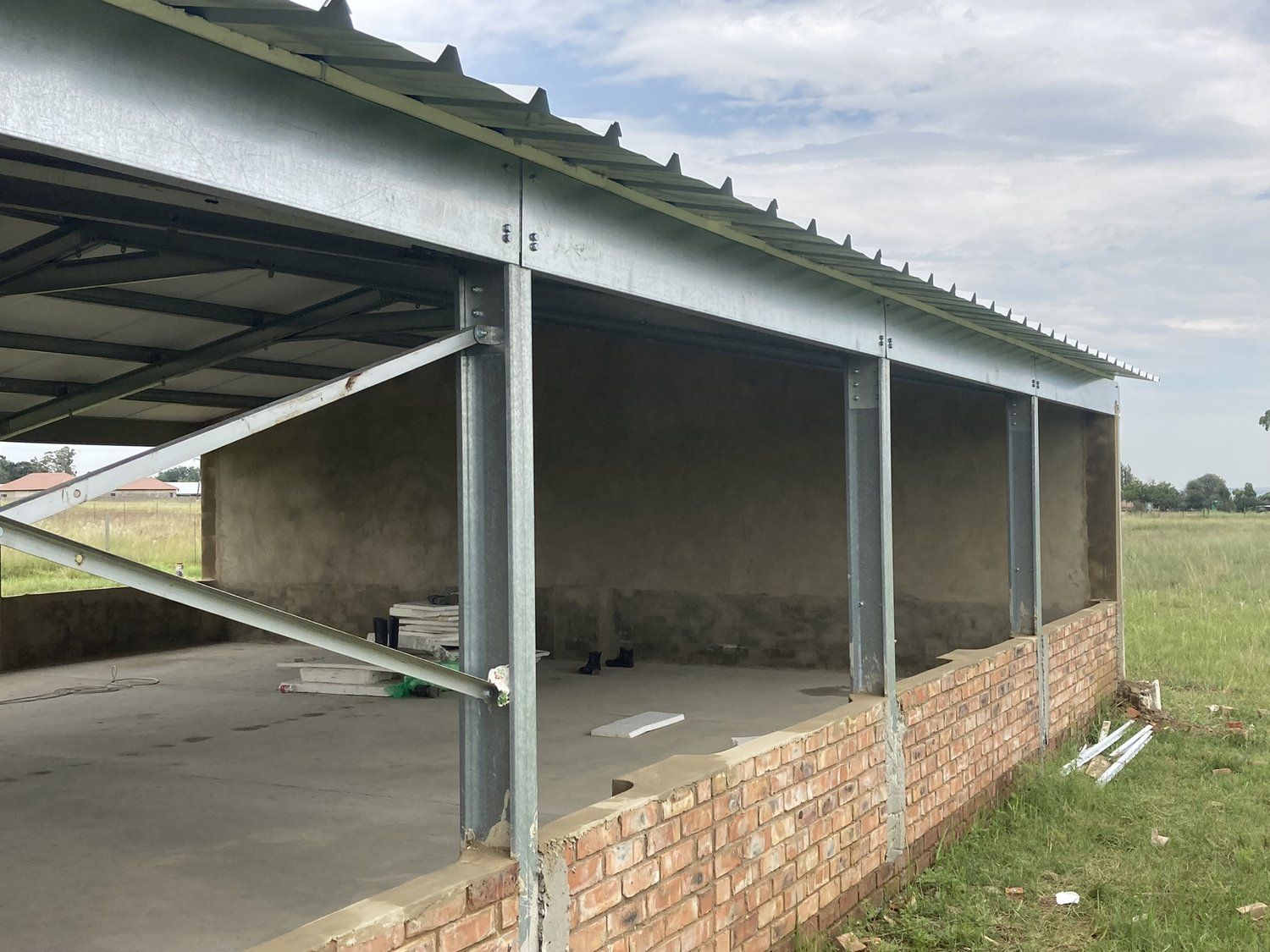 Erected cold-formed steel truss frame standing on a levelled site