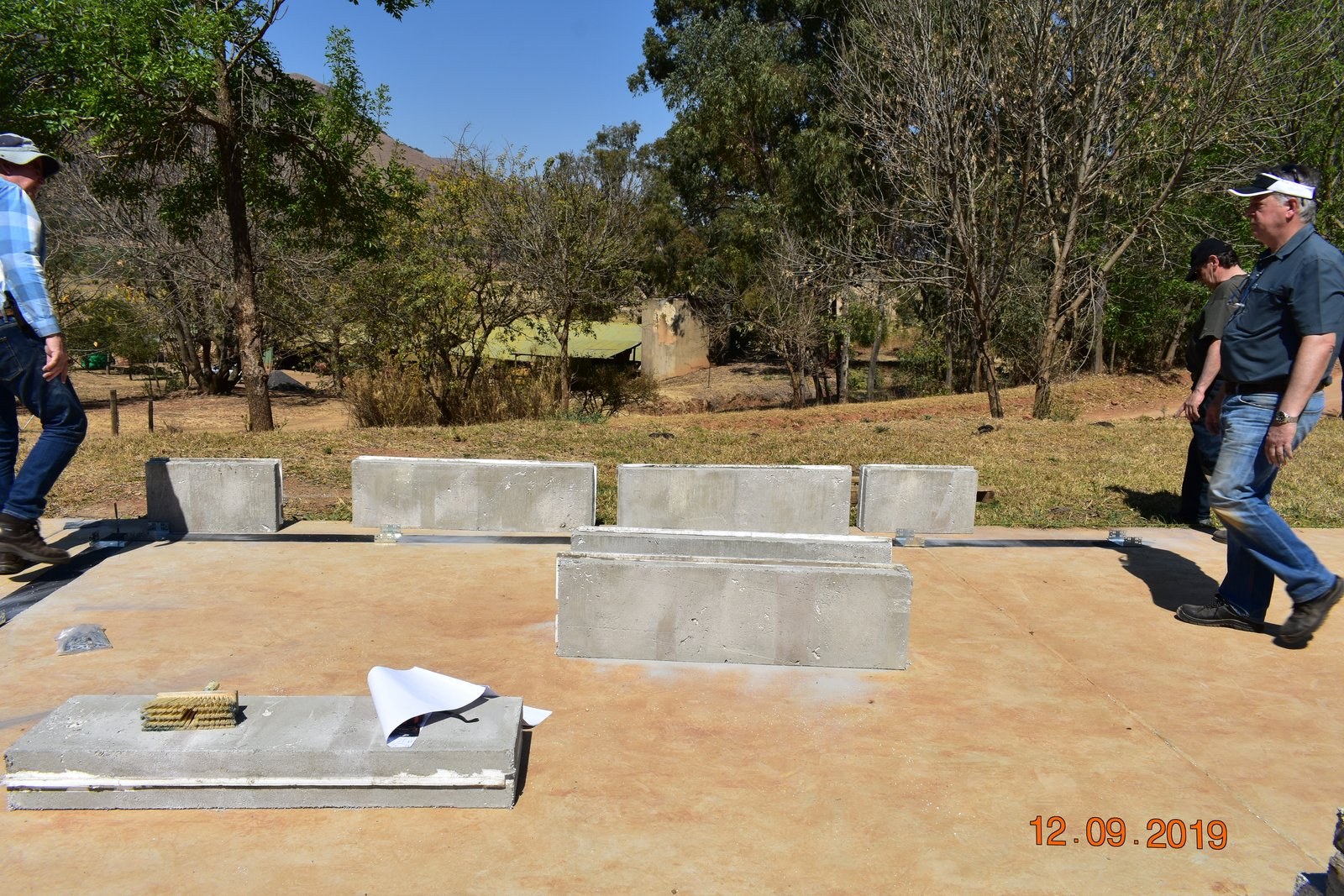 Precast edge panels stood along a slab perimeter, dated site photo from September 2019.